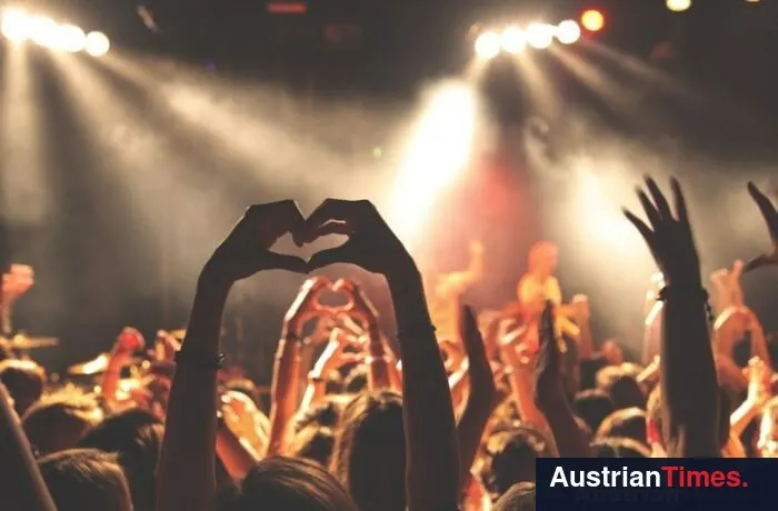 person performing heart hand gesture